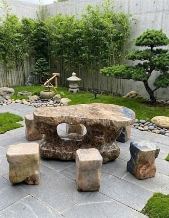 Bộ bàn ghế đá cà rốt tự nhiên gồm 6 đôn kích thước 1.5m x 95cm x 65cm T412