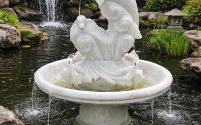 Giải Mã Bí Ẩn Phong Thủy: Tại Sao Tượng Thủy Luân Đá Tự Nhiên Lại Giúp Gia Chủ Tích Tụ Tài Khí?