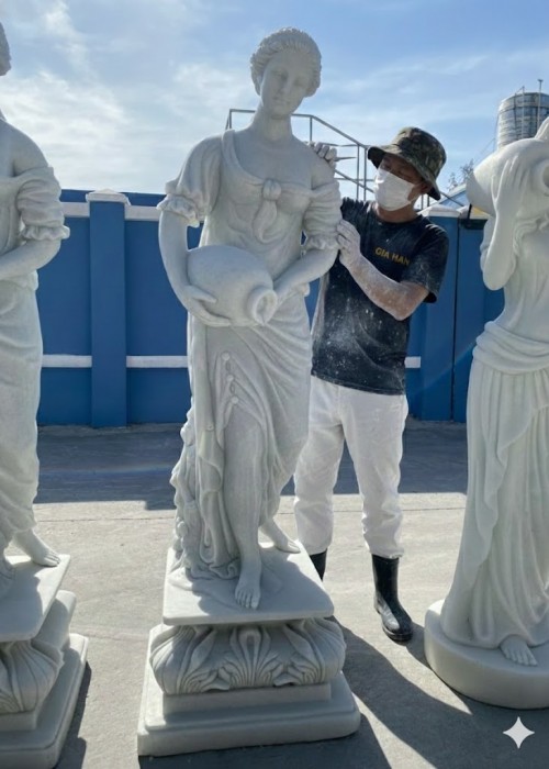 Tượng thiếu nữ Hy Lạp cầm bình nước đá trắng nguyên khối Cao 1.7m ngang 40cm dài 42cm T191